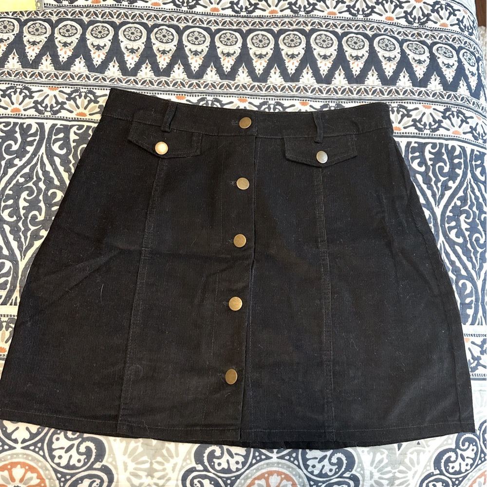 Black corduroy mini skirt